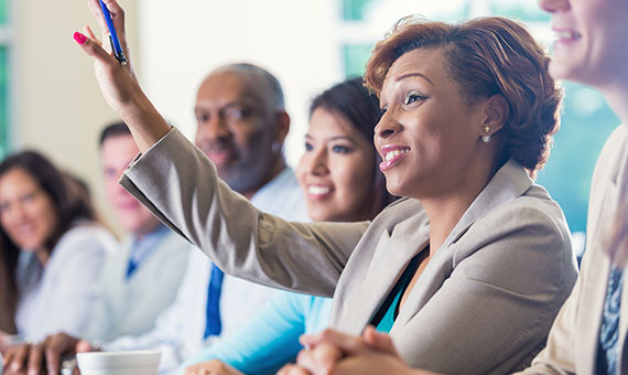 Education professional raising hand